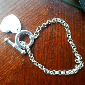 CHARMING Retired Premier Designs BraceletSilver plated bracelet, it is 7 1/2".